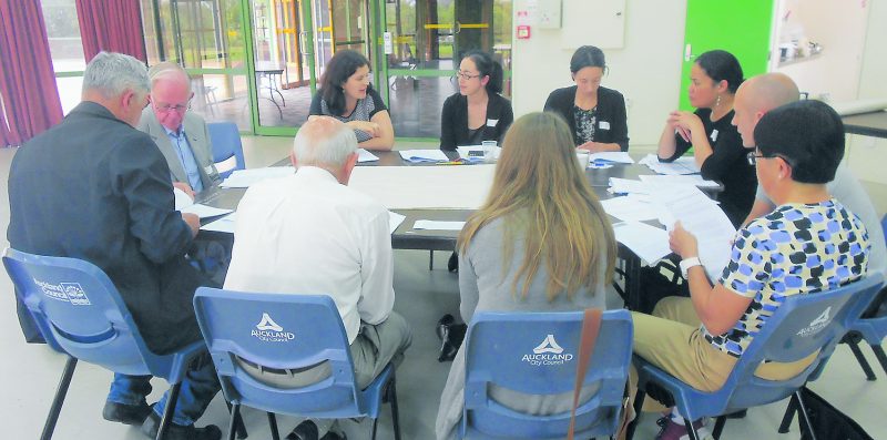 Members of the Auckland District Council of Social Services discuss the issue of responsible lending on November 25.