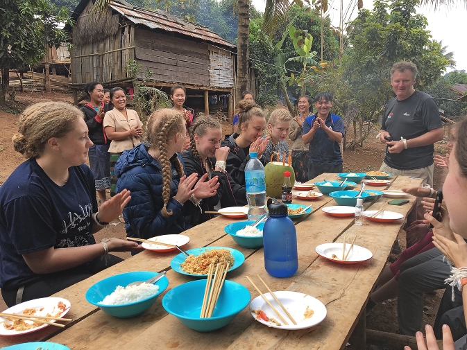 A birthday celebrated at the village in Laos. Meals on the visit consisted mainly of rice and vegetables and occasionally meat for a treat.