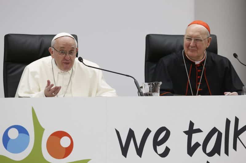 Pope Francis speaks at a pre-synod gathering of youth delegates in Rome in this March 19, 2018, file photo. Also pictured is U.S. Cardinal Kevin J. Farrell, prefect of the Vatican's Dicastery for Laity, Family and Life. Originally scheduled for 2022, the next meeting of the Synod of Bishops will take place in October 2023 to allow for broader consultation at the diocesan, national and regional levels. (CNS photo/Paul Haring)