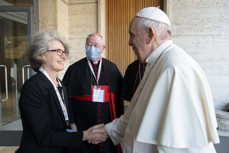 Pope Francis greets Sister Nathalie Becquart, undersecretary of the Synod of Bishops, during a meeting with representatives of bishops' conferences from around the world at the Vatican in this Oct. 9, 2021, file photo. Sister Becquart said Catholic women need to encourage and support one another for the realization of a church that is "truly inclusive." (CNS photo/Paul Haring)