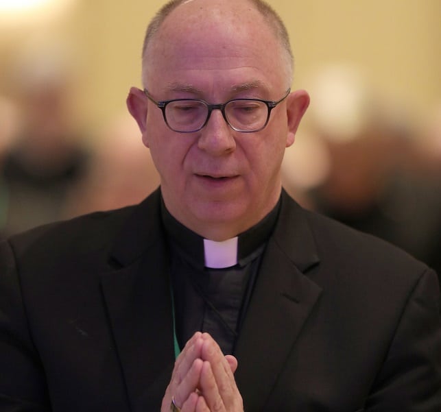 Archbishop Michael O. Jackels of Dubuque, Iowa, attends opening prayer during the 2018 fall general assembly of the U.S. Conference of Catholic Bishops in Baltimore. (CNS photo/Bob Roller)