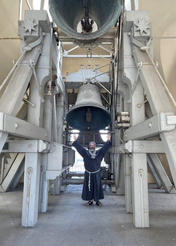 Conventual Franciscan Father Agnello Stoia, pastor of St. Peters Basilica, celebrates Easter by visiting the bells on top of the basilica at the Vatican April 17, 2022. Father Stoia said he wanted to be with the bells as they proclaimed the Resurrection to the city of Rome. (CNS photo/courtesy of Father Stoia)