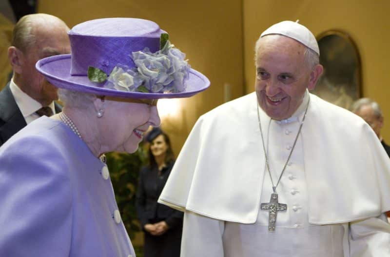 Britain's Queen Elizabeth II talks with Pope Francis during a meeting at the Vatican in this April 3, 2014, file photo. Queen Elizabeth died Sept. 8, 2022, at the age of 96. (CNS photo/Maria Grazia Picciarella, pool)