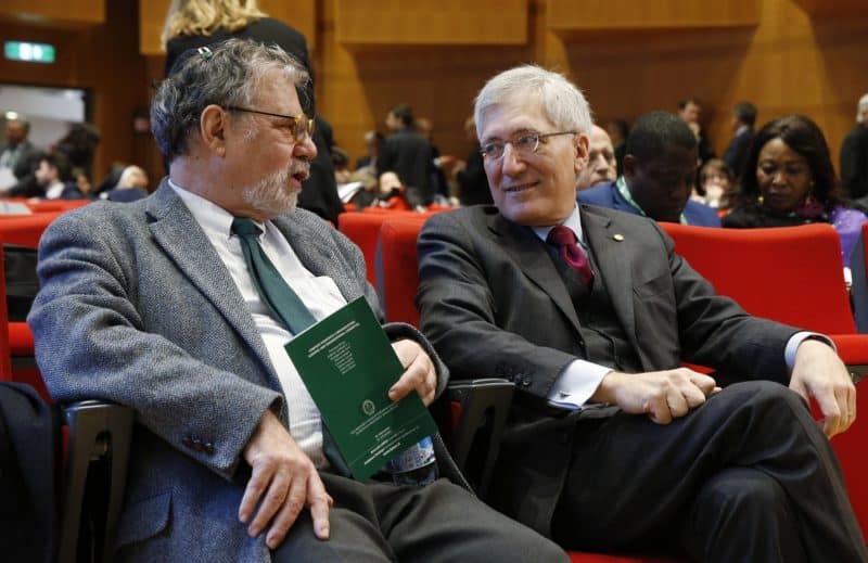 Joseph Halevi H. Weiler, a professor of law at New York University School of Law, talks with Robert George, a professor at Princeton University in New Jersey, during a conference on the Universal Declaration of Human Rights in Rome in this Nov. 15, 2018, file photo. Pope Francis has selected Weiler as one of two winners of the 2022 Ratzinger prize. The award honors scholars for their scientific research in the field of theology. (CNS photo/Paul Haring)