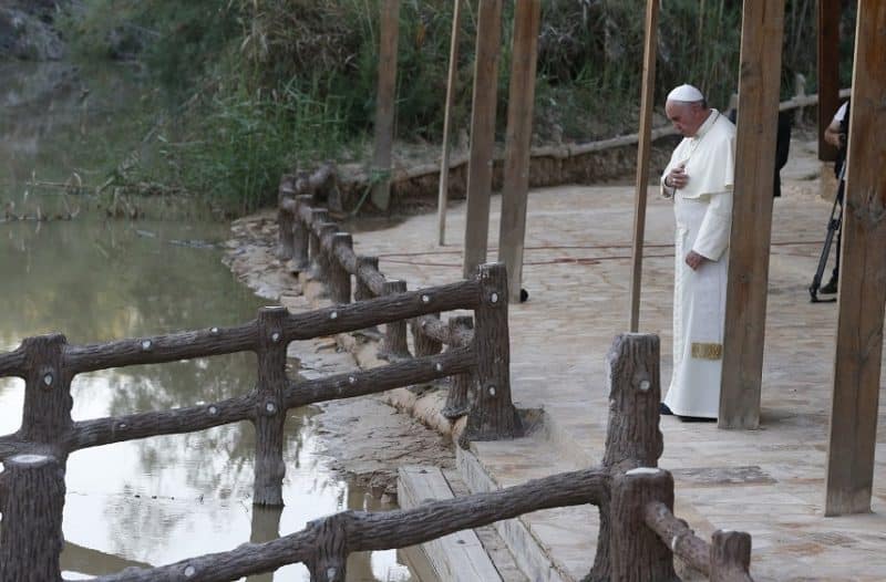 Pope Francis makes the Sign of the Cross in 2014 after praying at Bethany Beyond the Jordan, which UNESCO just declared a World Heritage Site and the location of Jesus' baptism. (CNS photo/Paul Haring)