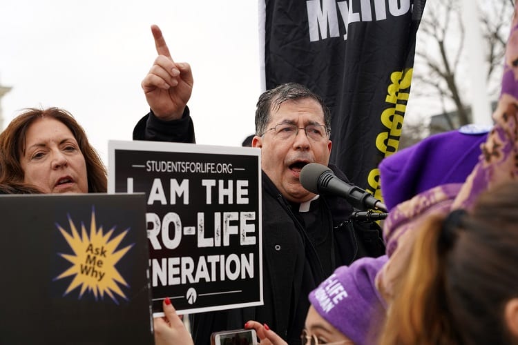 Father Frank Pavone, national director of Priests for Life, speaks in front of the U.S. Supreme Court during the 47th annual March for Life in Washington Jan. 24, 2020. (CNS photo/Gregory A. Shemitz, Long Island Catholic) See stories marked LIFE- Jan. 23 and 24, 2020.